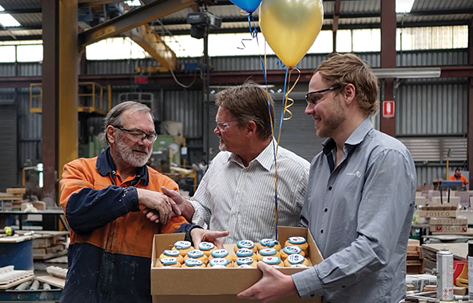 Pride: Photo of Employees Celebrating Family Business Day