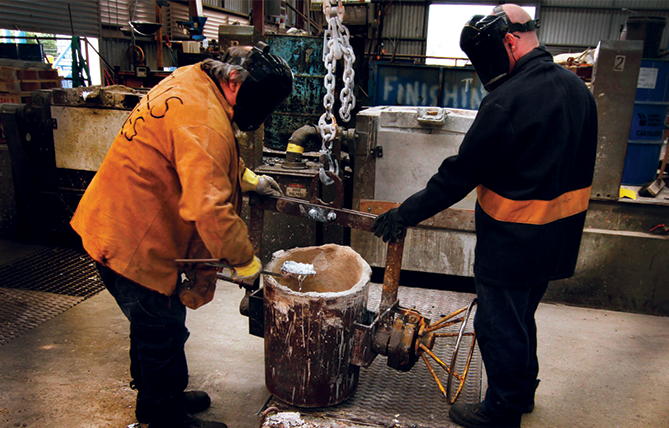 Will Do Attitude: Photo of Team working together in the Foundry. 